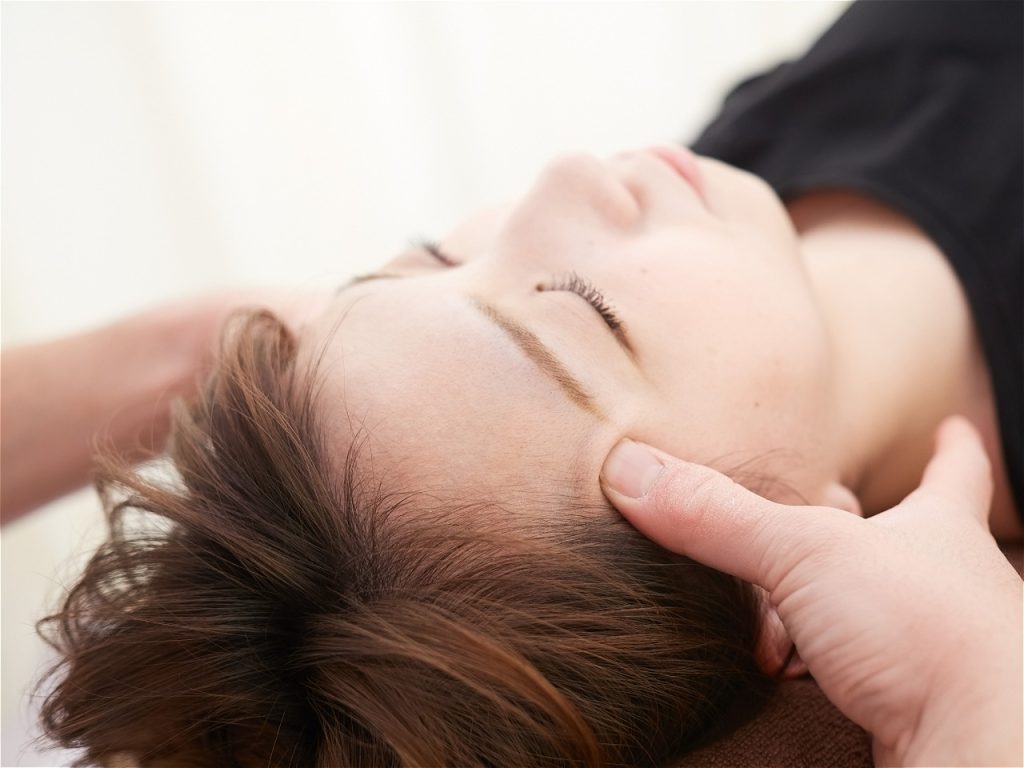 Person receiving a massage therapy